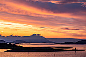 Midnight Sun in the Arctic Circle with a dramatic sky at twilight; Lofoten, Arctic Circle, Norway