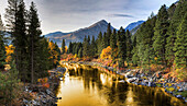Composite Entitled 'River Of Gold' Taken From A Bridge Over The Icicle River; Leavenworth Washington United States Of America