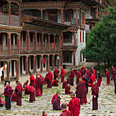 Monks Debating At Kharchu Dratsang Monastery; Bumthang District Bhutan