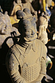 China, Beijing, Closeup Of Terra Cotta Figurines For Sale At Panjiayuan Or Dirt Market