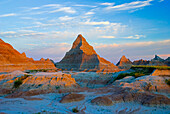 A Red Sunrise Illuminates The Hills In Badlands National Park; South Dakota United States Of America