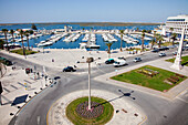 Cars On A Road Along The Waterfront And Harbour; Faro Algarve Portugal