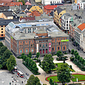 High Angle View Of West Norway Museum Buildings And Pedestrians In A Busy City; Bergen Norway