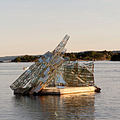 A Floating Glass Sculpture In The Water Outside Oslo Opera House; Oslo Norway