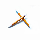 Broken pencil on white background