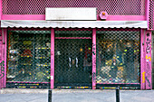 Pink Storefront with Closed Metal Security Doors, Madrid, Spain