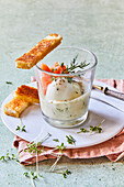 Egg in a glass with salmon and dill