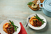 Pulled beef and pork with sweet potato puree and green asparagus