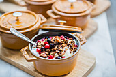 Granola with soy cream and fresh berries