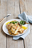 Cauliflower steaks with mashed potatoes and salsa verde