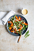 Pumpkin salad with hummus sauce