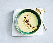 Zucchini soup with almonds and olives