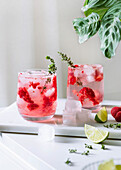 Raspberry infused water with lime and thyme