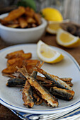 Fried sardines with homemade fries