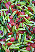Tomatoes and peeled green asparagus tips