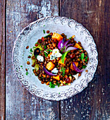 Italian lentil salad with pumpkin, gorgonzola and red onions