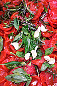 Tomatoes with rosemary, Thai basil and garlic
