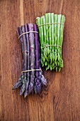 Green asparagus and purple asparagus, one bunch each
