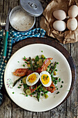 Spring vegetables with egg and bacon