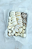 White Christmas cookies (with lemon, almond moons, gingerbread with icing, vanilla macarons, meringues)