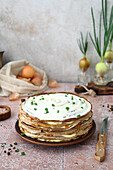 Liver crêpe pie with onions, carrots and mayonnaise cream