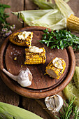 Grilled corn on the cob with garlic butter