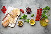 Ciabatta, olives, olive oil, basil, cherry tomatoes