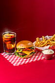 Cheeseburger with fries and cola