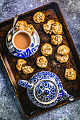 Chocolate chip cookies and tea with milk