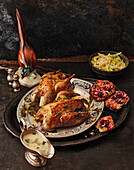 Roasted pheasant with blackberry scones, apple sauce, and creamy savoy cabbage