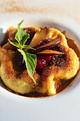 Potato bowl with plum jam