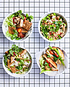 Salt and pepper tofu four ways: with fennel salad, with fried rice, with rice noodles and sambos