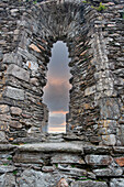 Church window is the centerpiece of the church at Glendalough, Ireland.