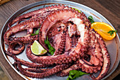 Lisbon, Portugal. Traditional grilled octopus