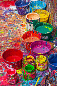 Argentina, Buenos Aires. Colorful paint splatters and buckets.