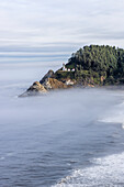 Usa, Oregon, Florence. Heceta Head Lighthouse, A Foggy Morning on the Pacific Surrounding the Heceta Head Lighthouse