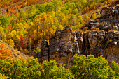 USA, Utah, Highway 89 and canyon walls of Logan pass with fall colors