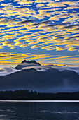 USA, Washington State, Seabeck. Sunset over Olympic Mountains and Hood Canal.