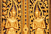 Laos, Luang Prabang. Goldene Reliefschnitzereien.
