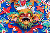Malaysia, Malacca (Melaka). The Cheng Hoon Teng temple, painted carving on building.