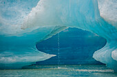 Iceberg melts into Shakes Lake.