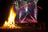 Fireworks and a bonfire on Guy Fawkes Day; Battle, East Sussex, England