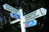 Local Village Signpost For Huntsham, Bampton, Clayhanger, Ashbrittle And Hockworthy, Mid Devon, South West, Uk