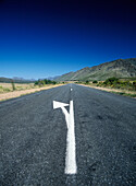 Arrow Road Marking In The Little Karoo Near Garcia, Western Cape, South Africa.