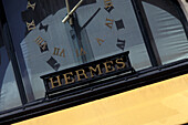 Close Up Of Clock On Shop Wall