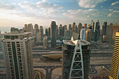 UAE, Dubai Marina; Dubai, Looking out across office and residential tower blocks