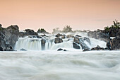 The Potomac River surges through a rocky gorge at Great Falls.