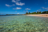 Crystal clear water and sandy beach with along the shoreline of Port-Louis, Grande-Terre; Guadeloupe, French West Indies