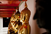 Buddha statues in the Wat Pho temple complex in Bangkok.