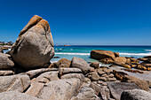 Large boulders and sandy beach at Clifton Beach on the Atlantic Ocean in Cape Town; Cape Town, Western Cape, South Africa